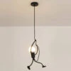 Modern Creative Iron People Lamp Adjustable Height Iron Chandelier